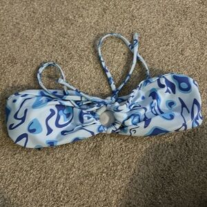 blue designed tube bathing suit top with tie in the front and matching bottoms